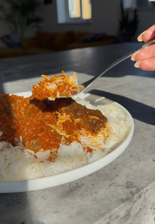 Spicy beef stew served with Pepper Pots